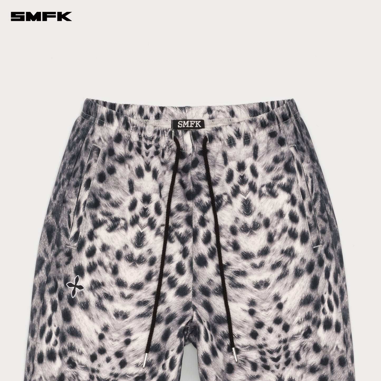 SMFK FUTURE Gene Wide-Leg Flared Sweatpants In White Leopard