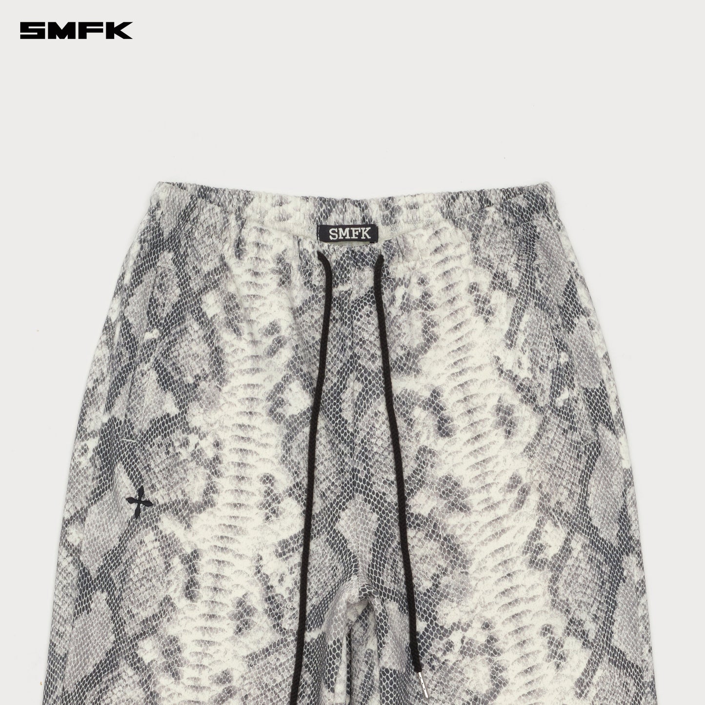 SMFK FUTURE Gene Wide-Leg Flared Sweatpants In Snake Pattern