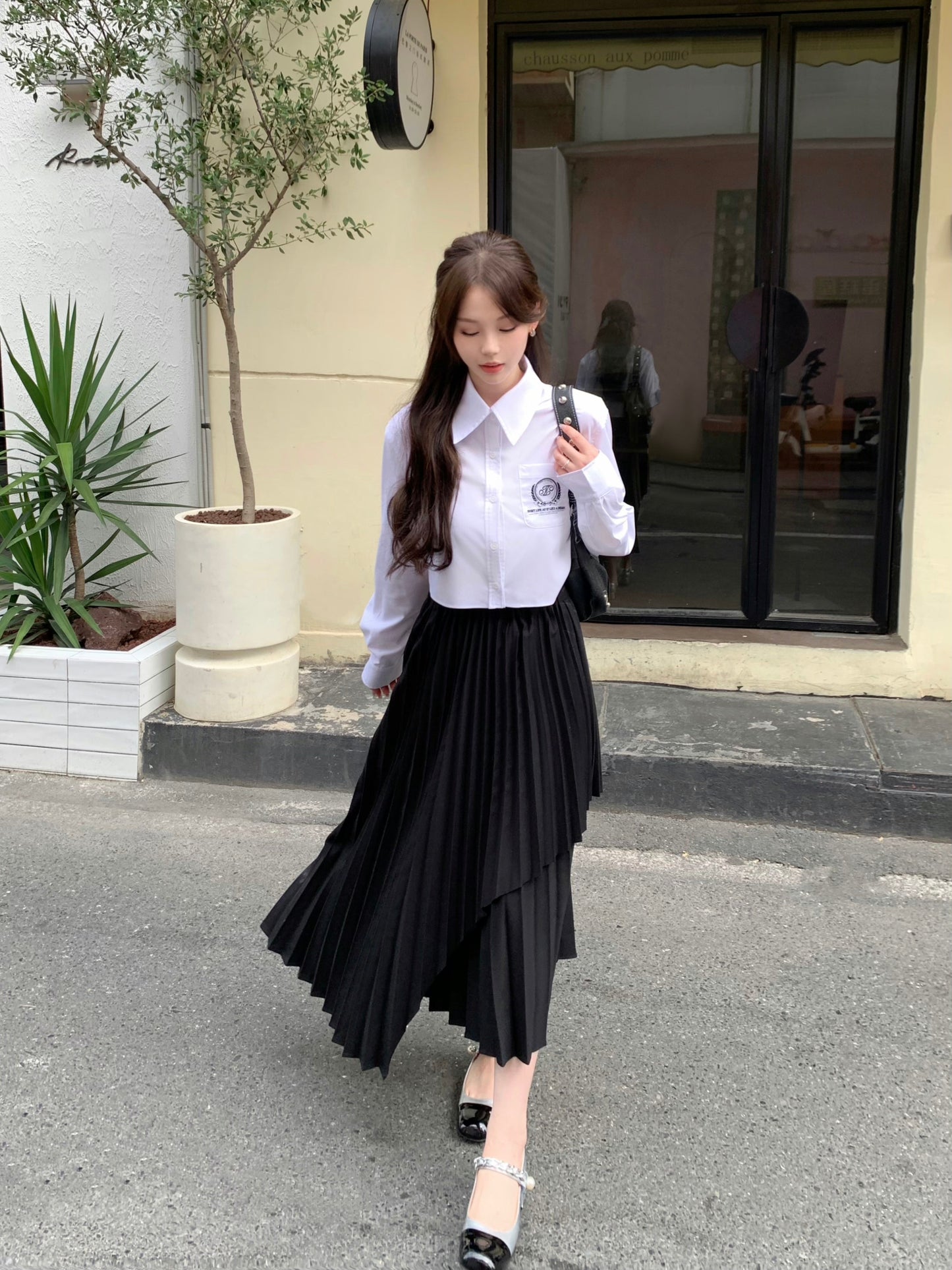 THREE QUARTERS Asymmetric Pleated Skirt