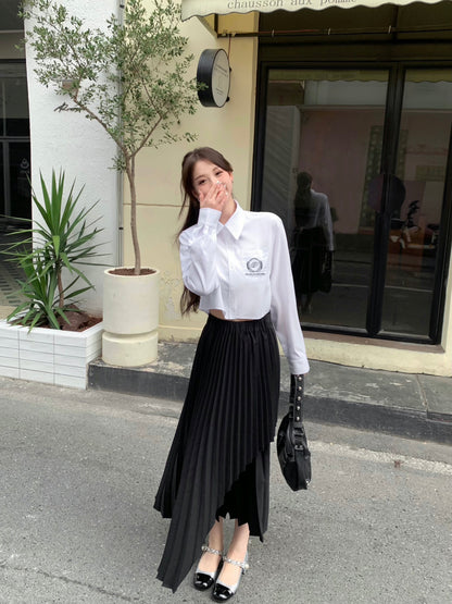 THREE QUARTERS Asymmetric Pleated Skirt